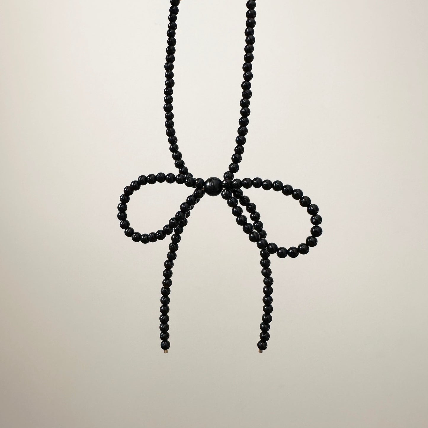 Onyx Bow Necklace